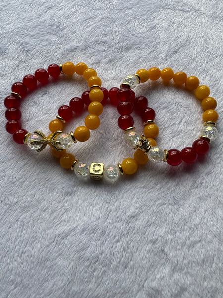 red and yellow bamboo with glass beads and gold accents women's bracelet set in size 7