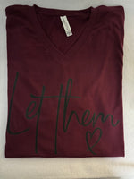 Let Them image on a v-neck unisex t-shirt