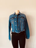 Blue denim jacket with rhinestone image