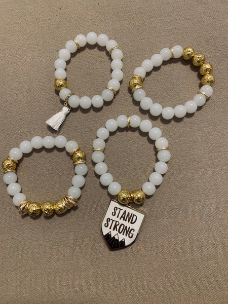 White and gold stack bracelet set